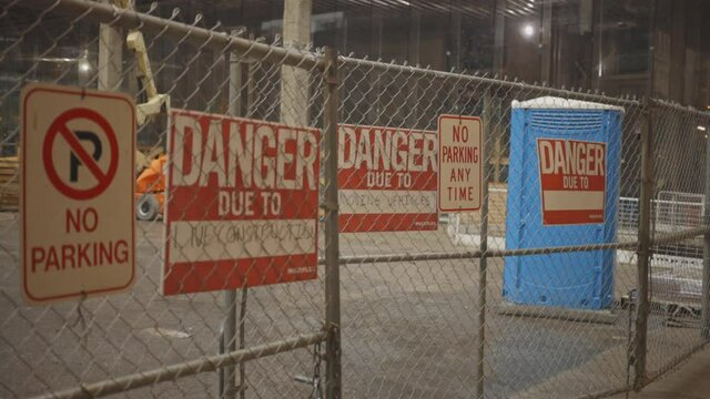 A construction site in Toronto showing precaution signs.