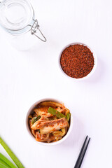 Kimchi cabbage on white background, Korean homemade fermented side dish food, Top view