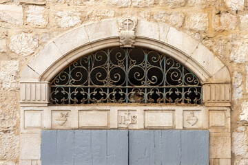 Christian symbols carved into the stone above the entrance to the house on Star Street in Bethlehem in the Palestinian Authority, Israel