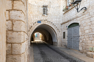 Fototapeta na wymiar Tunnel under a residential building on Star Street in Bethlehem in Bethlehem in the Palestinian Authority, Israel