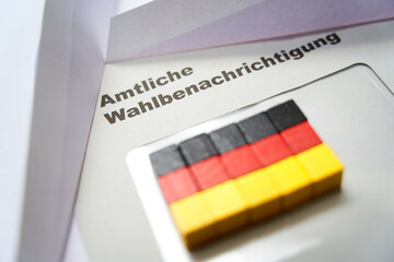 Black letters on white envelope saying: Official election notification (german: Amtliche...
