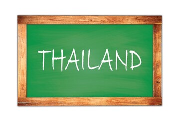THAILAND text written on green school board.