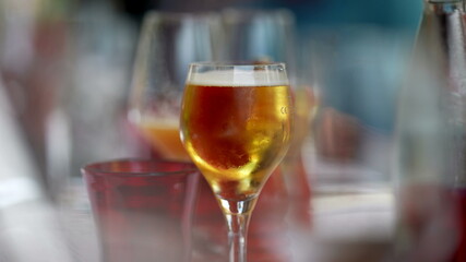 Glass beer close-up at restaurant, refreshment draft beer