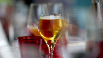 Glass beer close-up at restaurant, refreshment draft beer