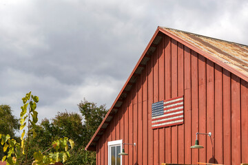 Wooden American  flag on wood barn wall, Vail Headquarters, Temecula, California