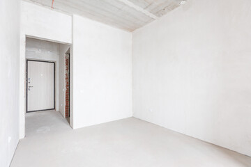 interior of the apartment without decoration in gray colors