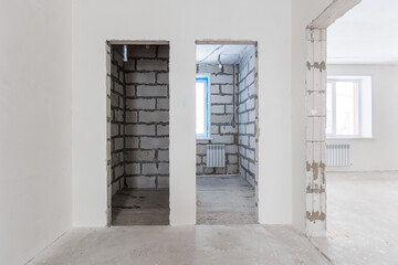 interior of the apartment without decoration in gray colors