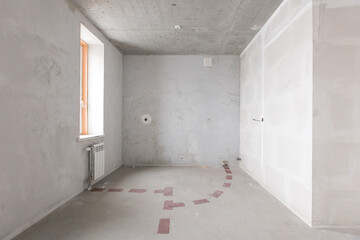 interior of the apartment without decoration in gray colors