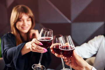 Young couple and mother. Indoors of new modern luxury restaurant
