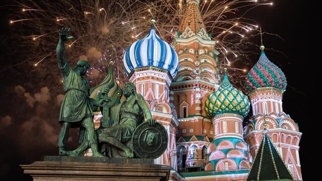 Celebratory colorful fireworks and Cathedral of Intercession of Most Holy Theotokos on the Moat ( Temple of Basil the Blessed),  Red Square, Moscow, Russia  