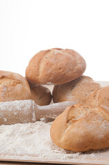 types of bread freshly baked with flour in a bakery