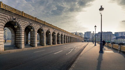 Paris, France - March 3, 2021: Bercy bridge arch in Paris - obrazy, fototapety, plakaty