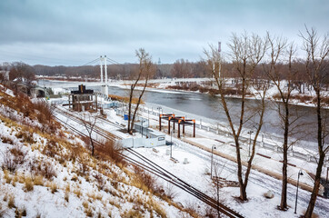 The embankment and the Ural river at the beginning of winter. The picture was taken in Russia, in the city of Orenburg