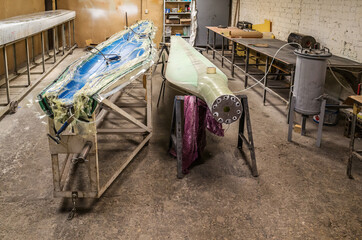Manufacturing of blades for wind turbines by vacuum infusion. The picture was taken in Russia, in...