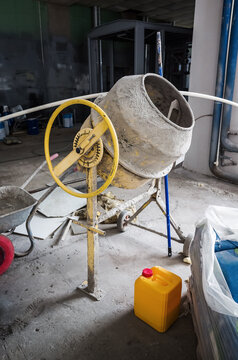 Concrete mixer at a construction site. The picture was taken in Russia, in an industrial building