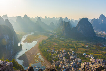 Sunlight over the beautiful karst landscape of Xingping, Guilin, China