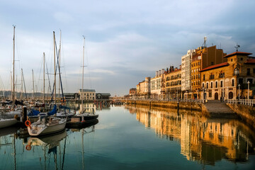 Fototapeta na wymiar Sunset in the marina of Gijón, Asturias, Spain