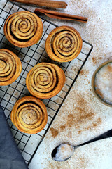 Freshly Baked Traditional Sweet Cinnamon Rolls on a Cooling Rack