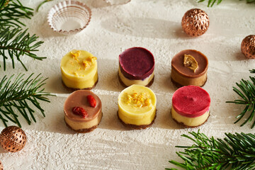 Raw vegan Christmas cookies with lemon, goji, blueberry and raspberry