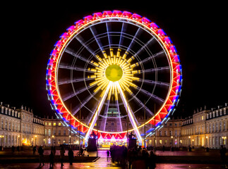 Giant ferris wheel on the “Schlossplatz“ central square in the heart of Stuttgart Germany....