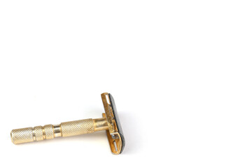 Steel gold razor on white background, copy space