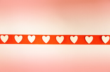 horizontal background for Valentine's Day. red ribbon with hearts