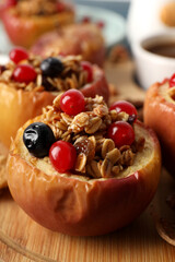 Concept of tasty food with baked apple, close up