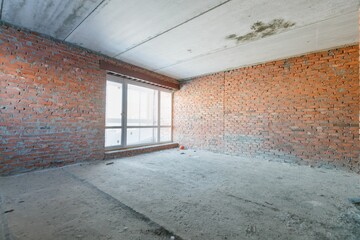 Obraz premium interior of the apartment without decoration in gray colors