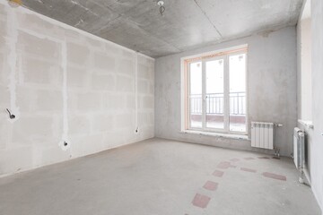 Fototapeta premium interior of the apartment without decoration in gray colors