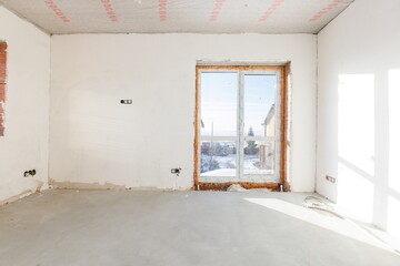 Fototapeta premium interior of the apartment without decoration in gray colors