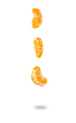 Tangerine slices isolated on white background. Levitation.