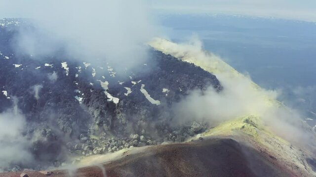 Avachinsky Volcano Fly Over Smoky Yellow Sulfur Crater Edge with Lava, Kamchatka