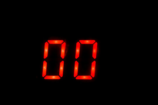 Old Digital Clock Red Number On Black Background