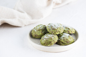 Homemade gingerbread mint cakes with matcha in a plate on the table.