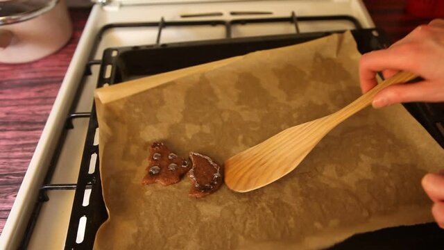 Making cookies. Molding cookie dough. Female hands making cookies on table in kitchen (Soviet Union old flat)
