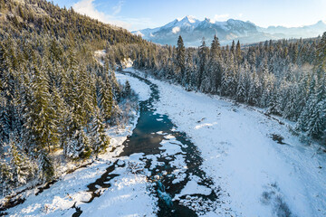 Frozen River and Tatra Mountains in Winter, Aerial Drone Landscape