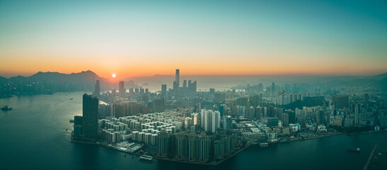 Naklejka premium Aerial panorama landscapes of Hong Kong city in sunset