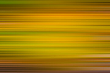 Obraz premium Blurred concentrated horizontal yellow and green stripes with brown vignette. Background