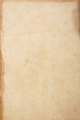 Old brown kraft paper background macro texture with stains