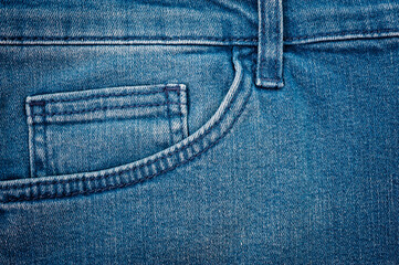 Close up of blue denim texture with sewing.
