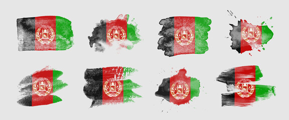 Painted flag of Afghanistan in various brushstroke styles.