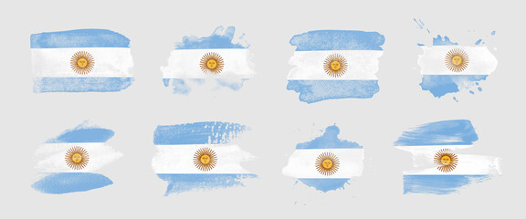 Painted flag of Argentina in various brushstroke styles.