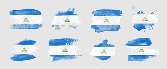 Painted flag of Nicaragua in various brushstroke styles.