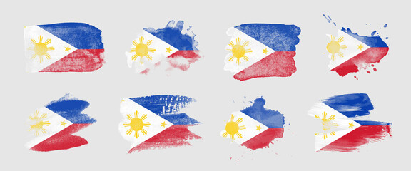 Painted flag of the Philippines in various brushstroke styles.