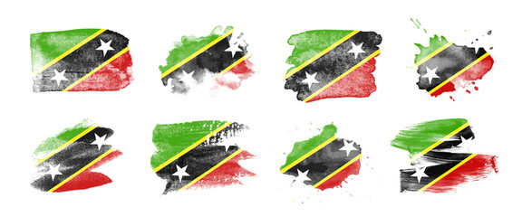 Painted flag of Saint Kitts and Nevis in various brushstroke styles.