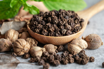 black pepper and siam cardamom (Amomum krervanh Pierre), Asia dried spices herb for drug and Thai...