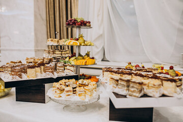 Wedding food tables at a restaurant with decorations