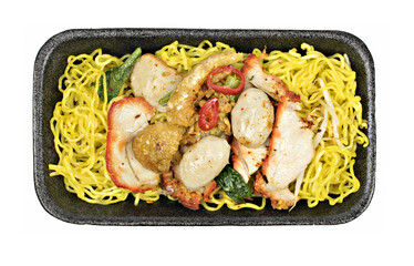 pork dry noodles in black bowl isolated on white background top view.