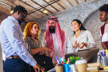 Multicultural business people meeting and talking about business. Arab business people in a meeting