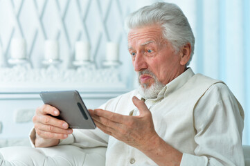 Close up portrait of thoughtful senior man